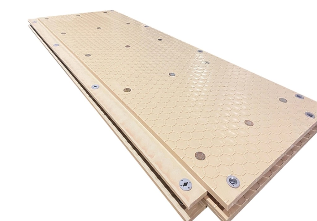 Thick, interlocking heavy duty HDPE ground mats for tracked vehicles